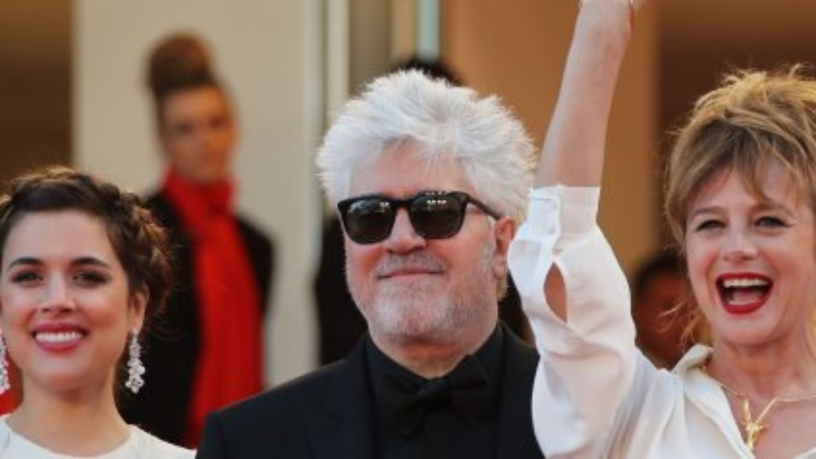 (From L) Spanish actress Adriana Ugarte, Spanish director Pedro Almodovar and Spanish actress Emma Suarez pose as they arrive on May 17, 2016 for the screening of the film "Julieta" at the 69th Cannes Film Festival in Cannes, southern France.  / AFP PHOTO / Valery HACHE